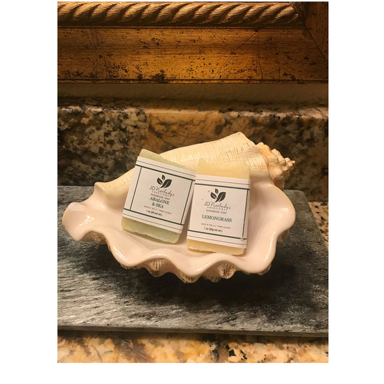 two guest soaps resting in a shell at Point Pleasant Resort on St. Thomas Virgin Islands that are made by JDNatlady's Creations